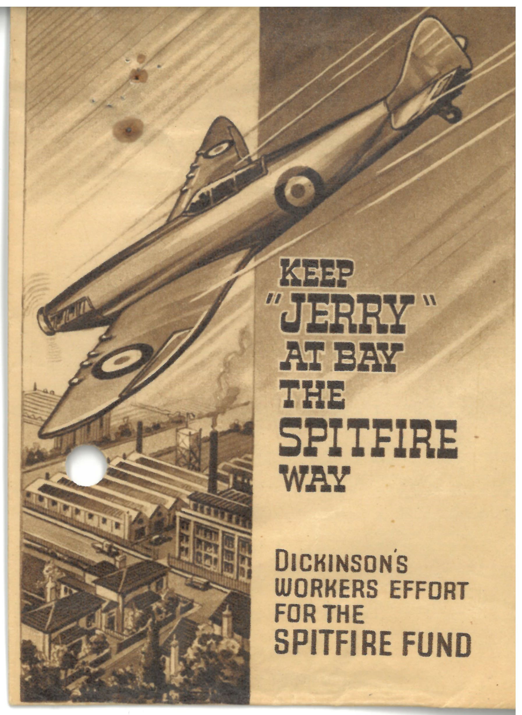 A photograph of a rectangular envelope with illustration of a Spitfire plane flying over a paper mill. The text reads: Keep "Jerry" at bay the Spitfire way. Dickinson's workers effort for the Spitfire Fund.